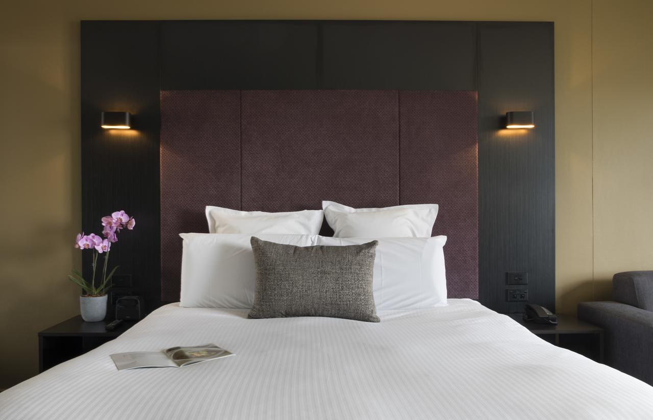 Pullman Sydney Hyde Park Otel Dış mekan fotoğraf A bedroom at the hotel